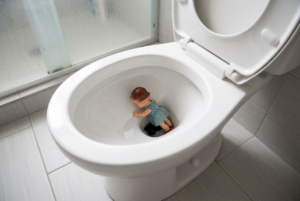 doll in toilet